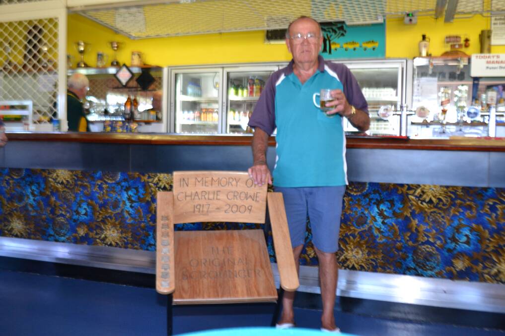 Honours: Winner of the Charlie Crowe Day scroungers event Peter Kaurin with the memorial chair. Photo: supplied.