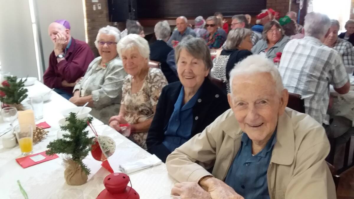 Festive feast: Enjoying the Seniors Christmas Lunch were Bob and Isabel Lutz, Sylvia King and Faye and Bob Bunce. Photo: Supplied.