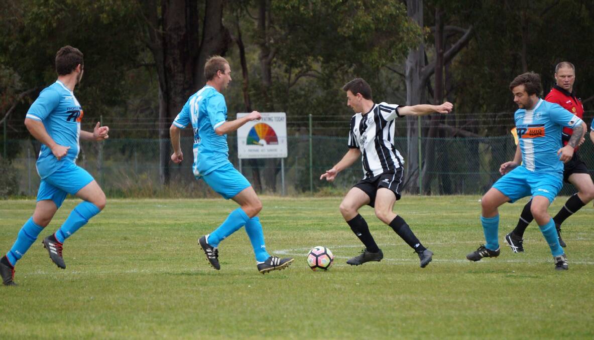 Top League team: Collie Power's Ryan Walkerden getting past a Hay Park player. Photo: supplied.