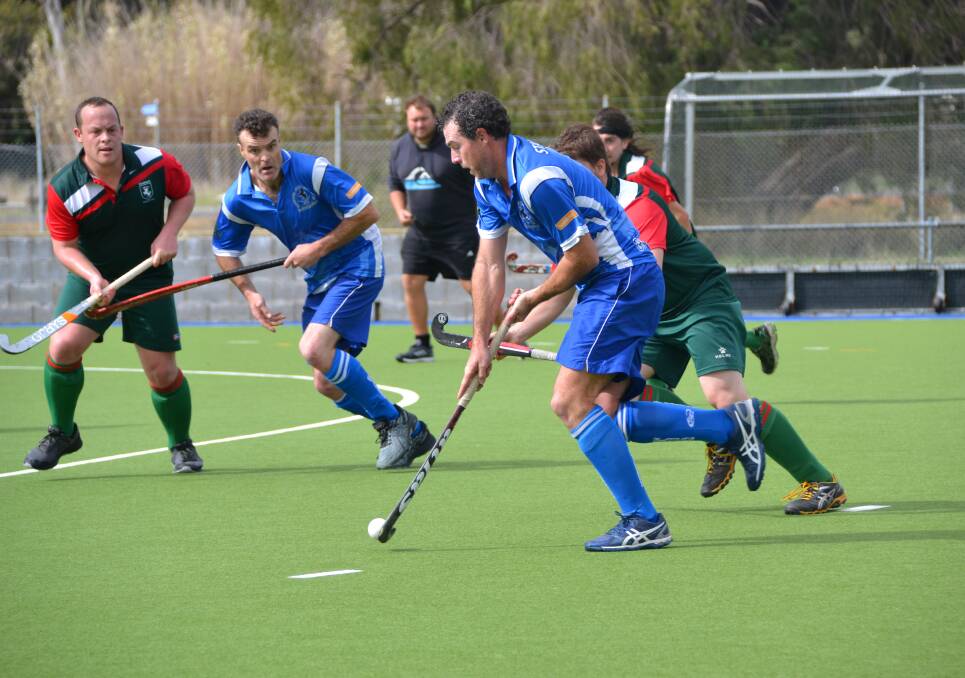 Fast paced: Mustangs' Dave O'Brien with the ball. Photo: Taylar Amonini. 