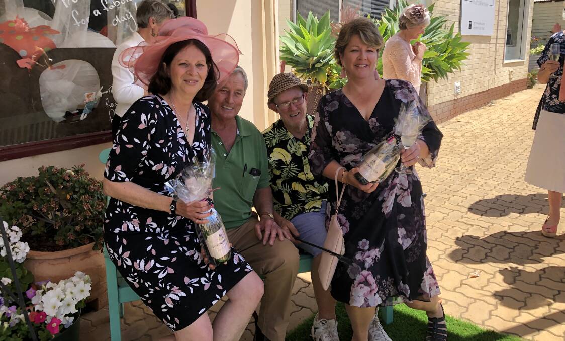 Race ready: Winners of the Fashions on the Field Kylie Schinzig and Robyn Lubcke with judges John Wilkie and Wayne Stockley. Photo: Supplied.