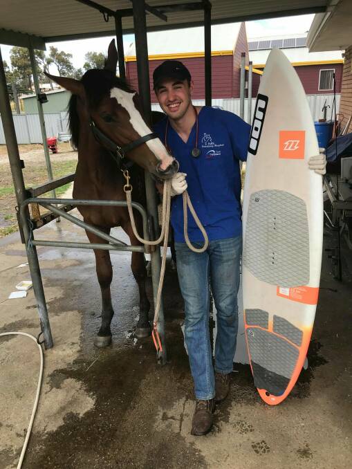 Two passions: Veterinarian Nick Hamill will be competing in the Red Bull Lighthouse to Leighton kiteboarding race this weekend. Photo: supplied.