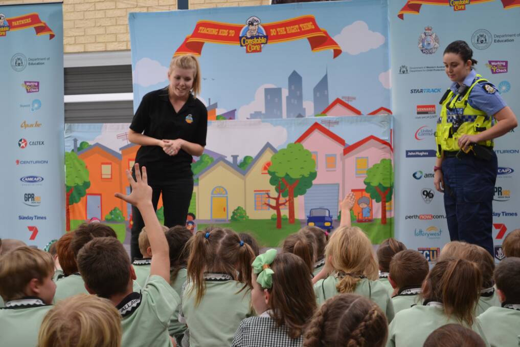 Engaged: Constable Care answers Allanson Primary School pupils questions on the importance of recycling.